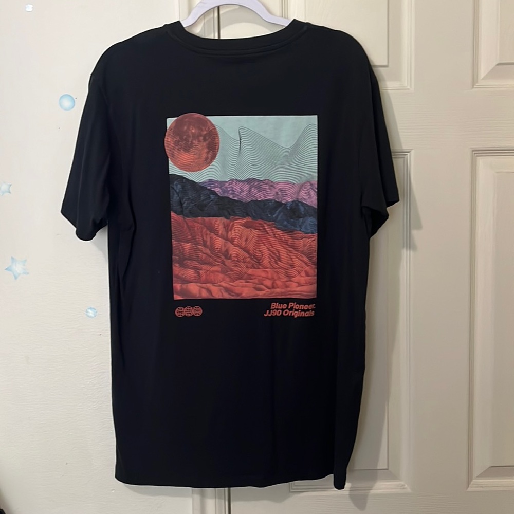 Large Black T-Shirt with Cool Design on the Back.